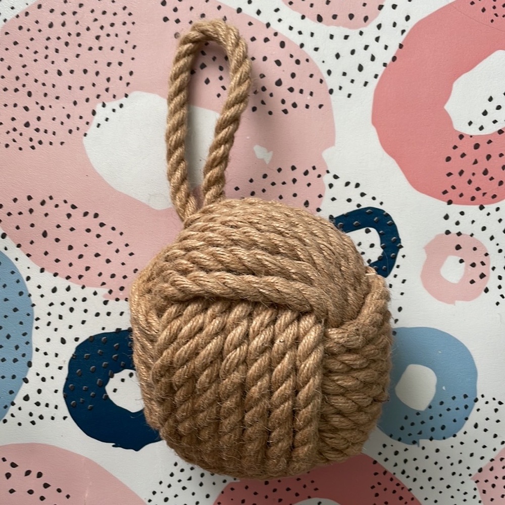 Nautical rope balls decorative accent or can use as door stops.